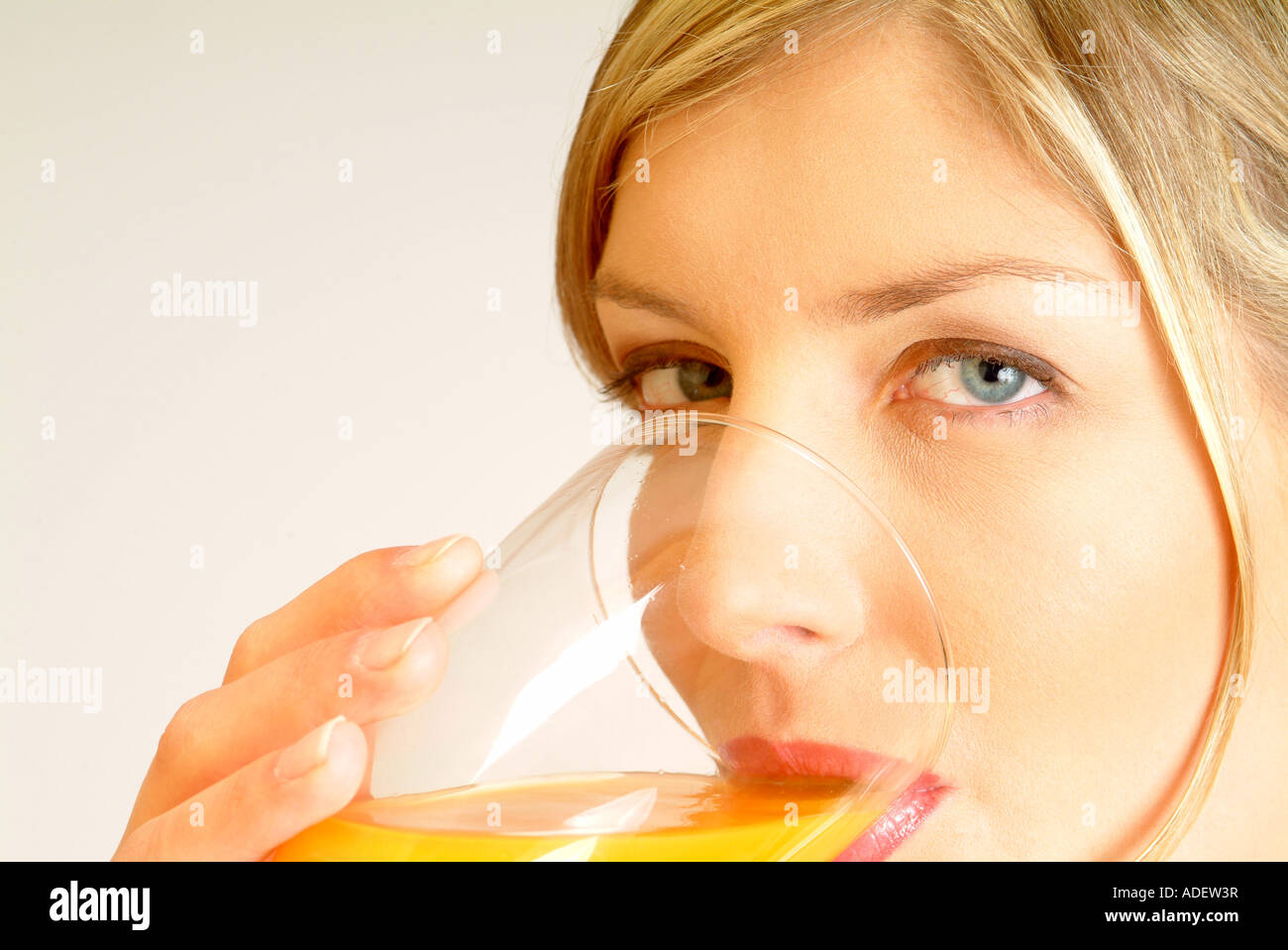 Closeup of Woman drinking juice Stock Photo Alamy
