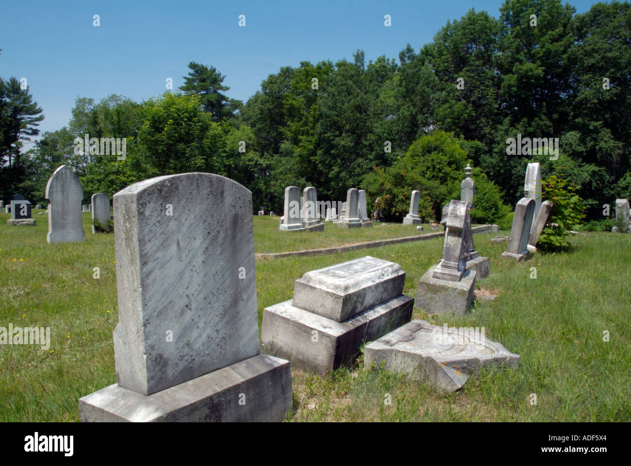 Old weathered headstones in an scenic New England graveyard Stock Photo ...