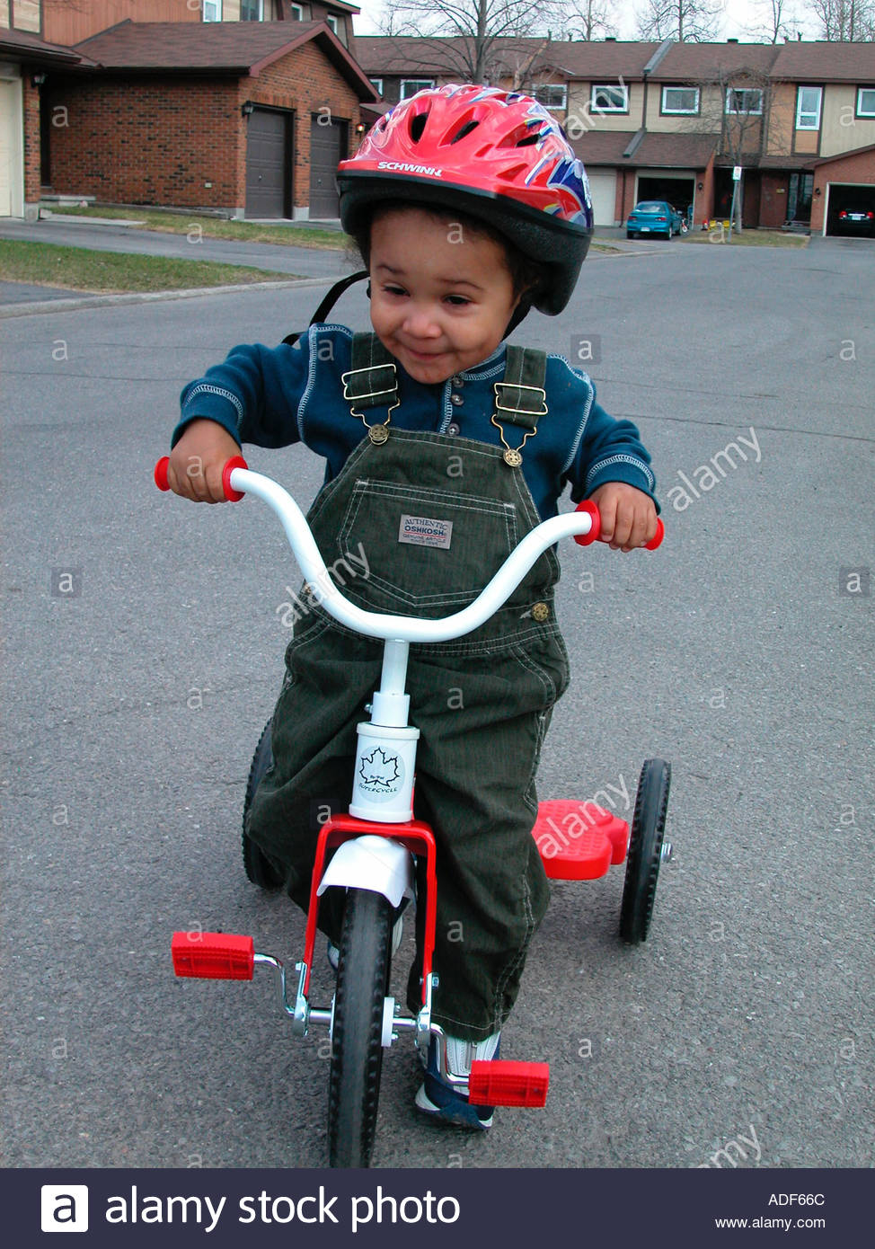 child riding tricycle