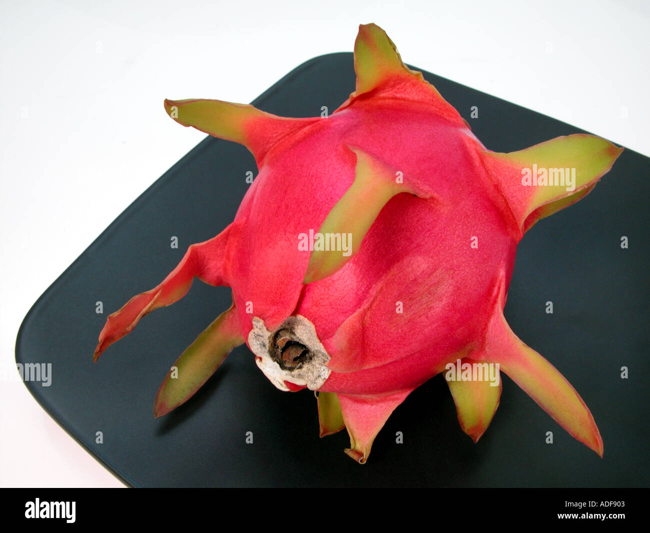 the pitahaya fruit on a black plate  strawberry pear Colombia Stock Photo