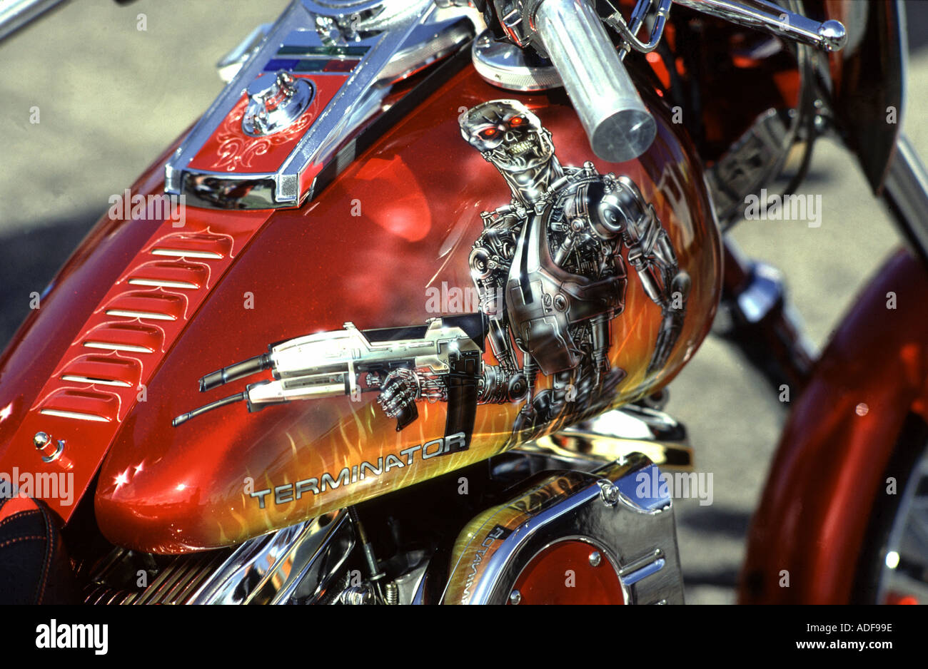 Terminator figure painted on the gas tank of a customised Harley Davidson motorcycle Stock Photo
