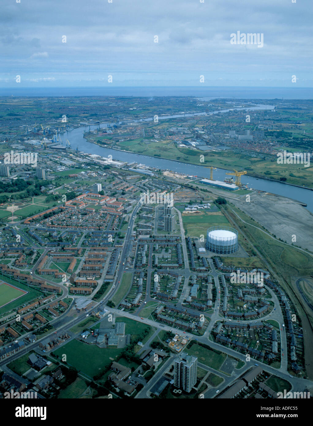Aerial view east over the River Tyne towards Tynemouth, Tyne and Wear, England, UK., in the 1980s Stock Photo