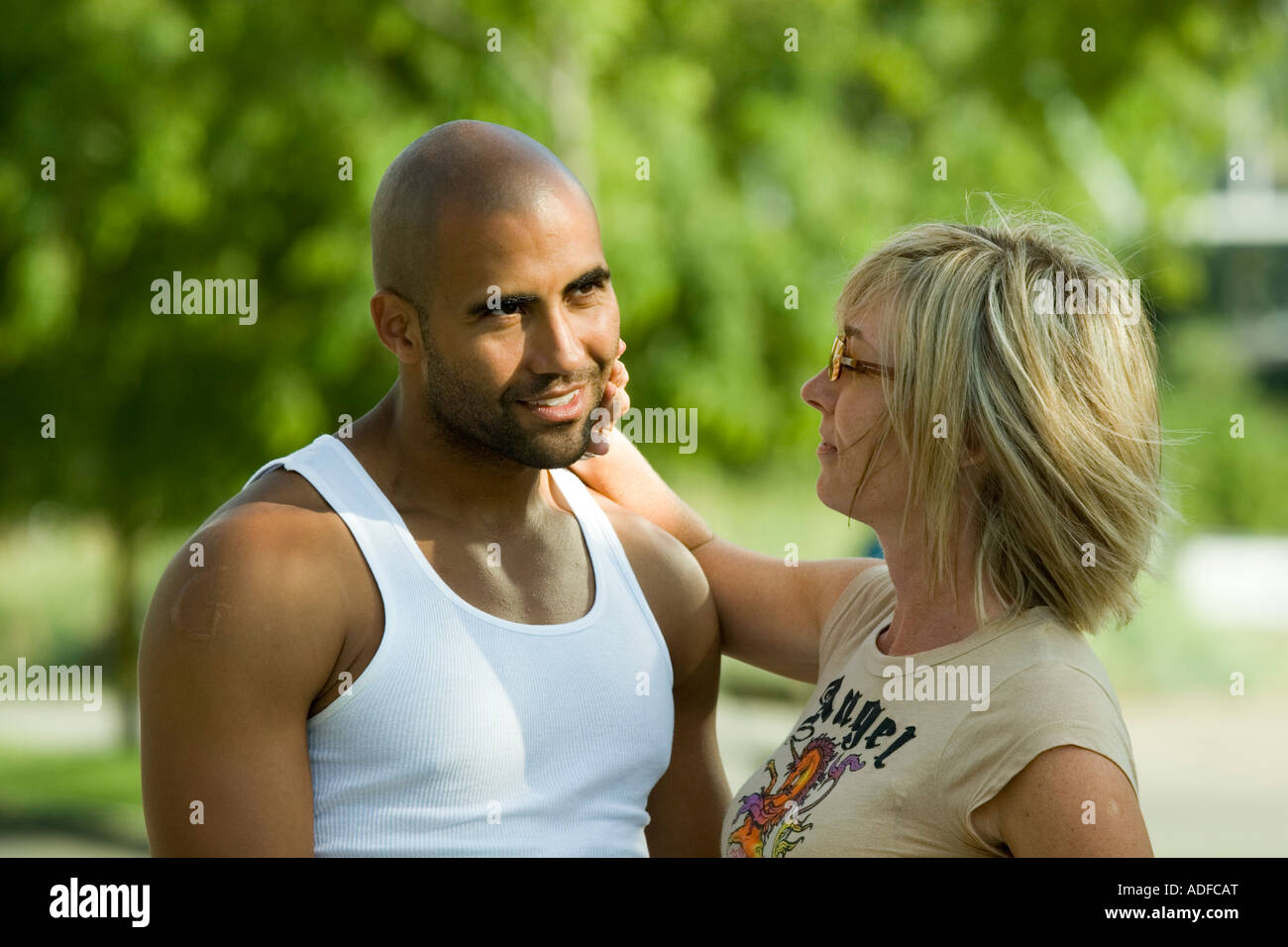 Interracial love story of a black man and a white woman Model released Stock Photo