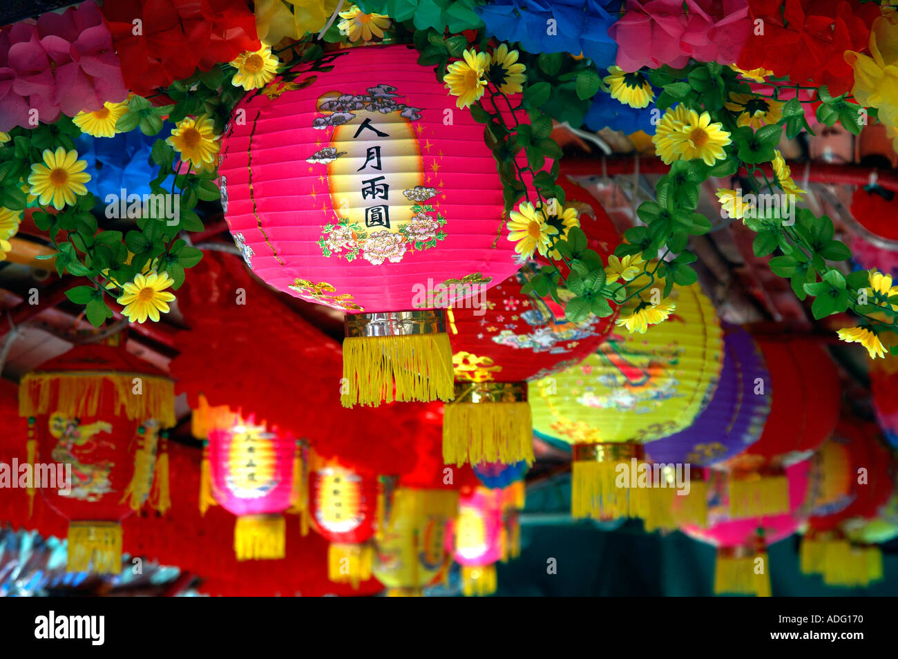 Chinese lanterns hanging from the roof of a sampan near the floating restaurants at Aberdeen Harbour Hong Kong China Stock Photo
