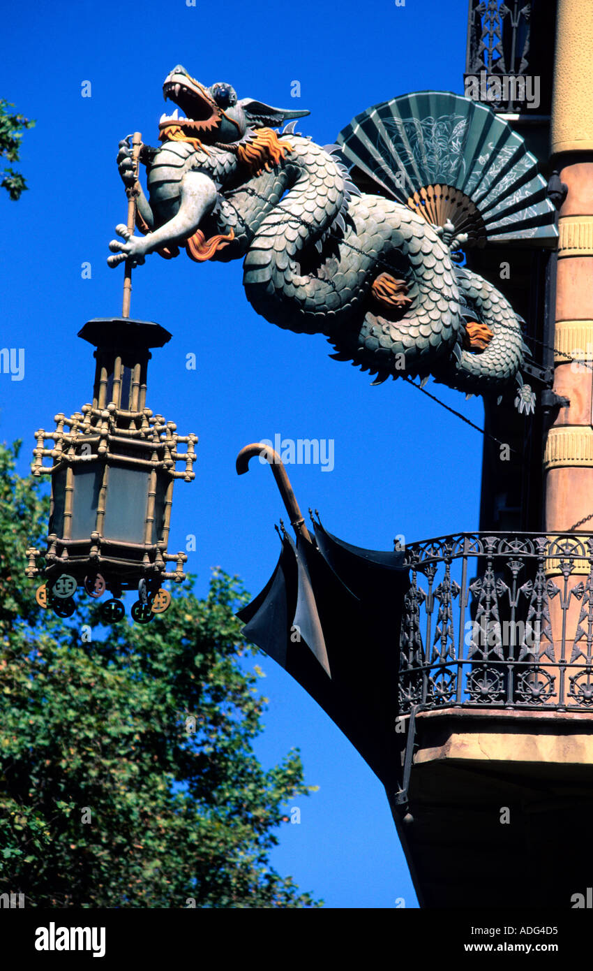 The famous Oriental Dragon lantern and umbrella decorate Casa Bruni  in Las Ramblas pedestrian way Barcelona Stock Photo
