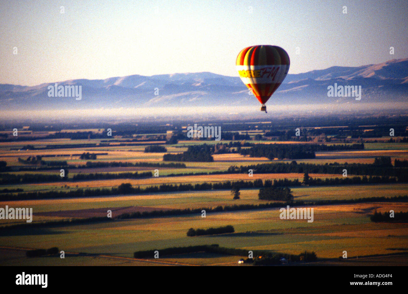 A hot air balloon over the Canterbury Plains South Island New Zealand Stock Photo