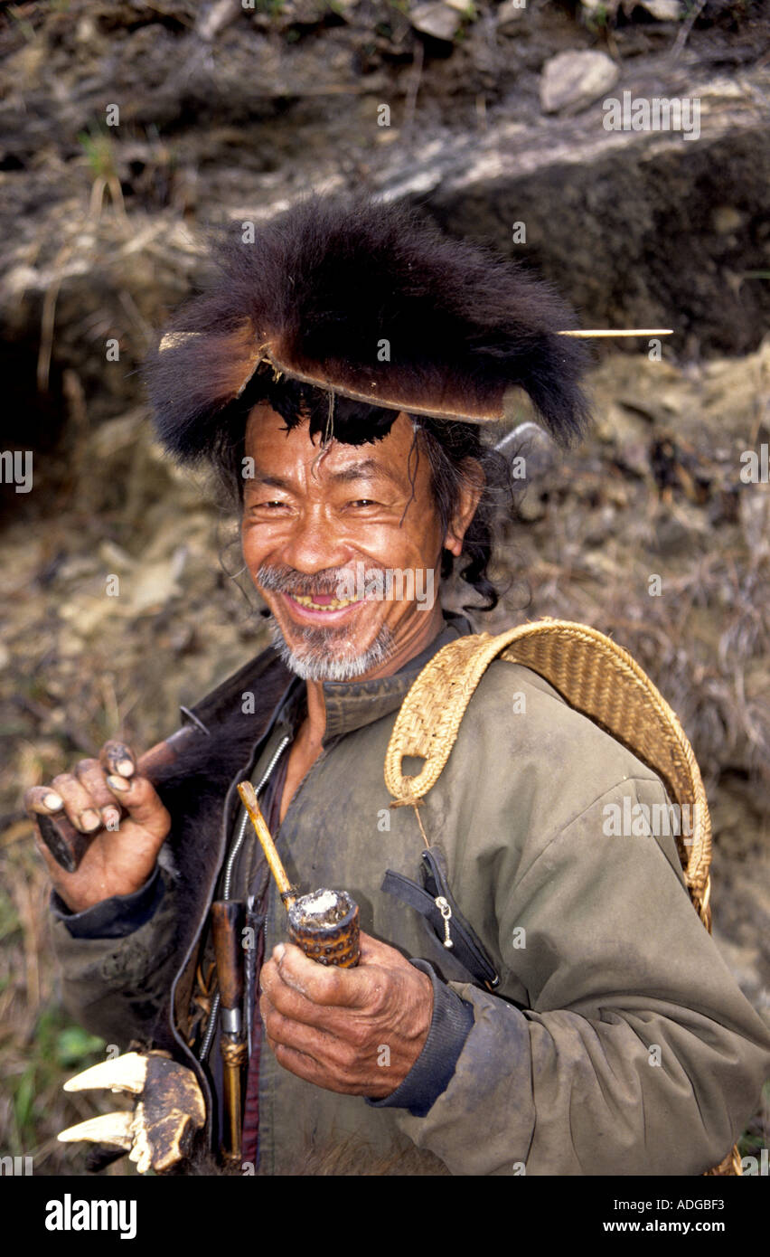 Corncob pipe smoking man of the Hill Miri Tribe in Arunachal Pradesh NE