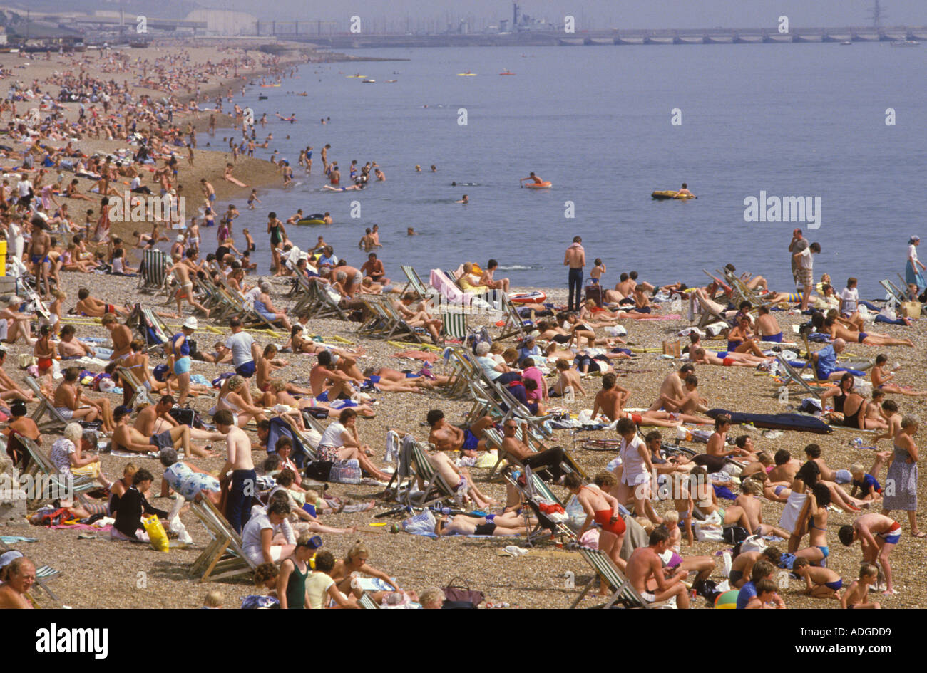 Brighton beach crowded with holidaymakers East Sussex. South coast