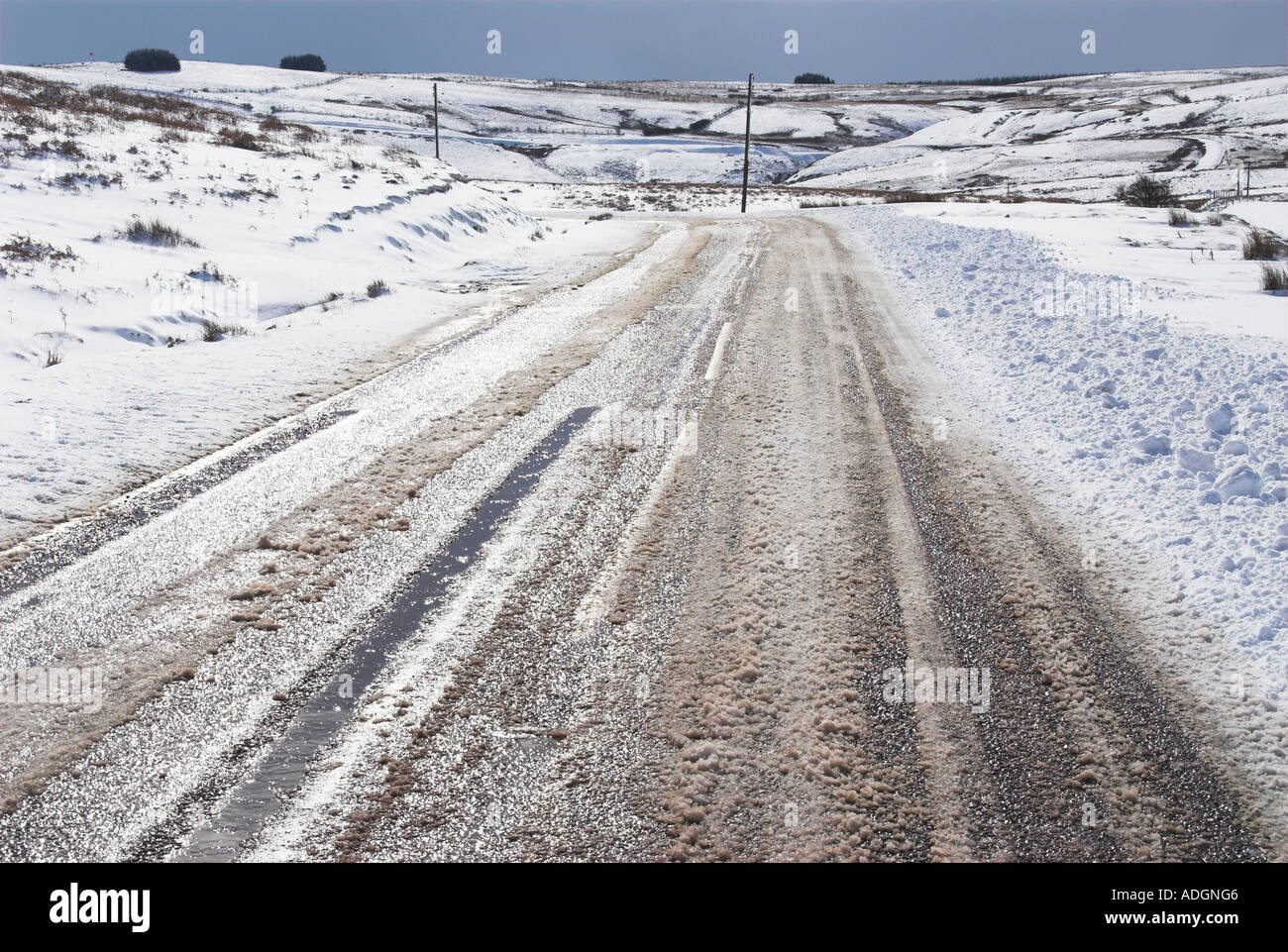 UK Wales Powys tracks through wintery landscape Stock Photo
