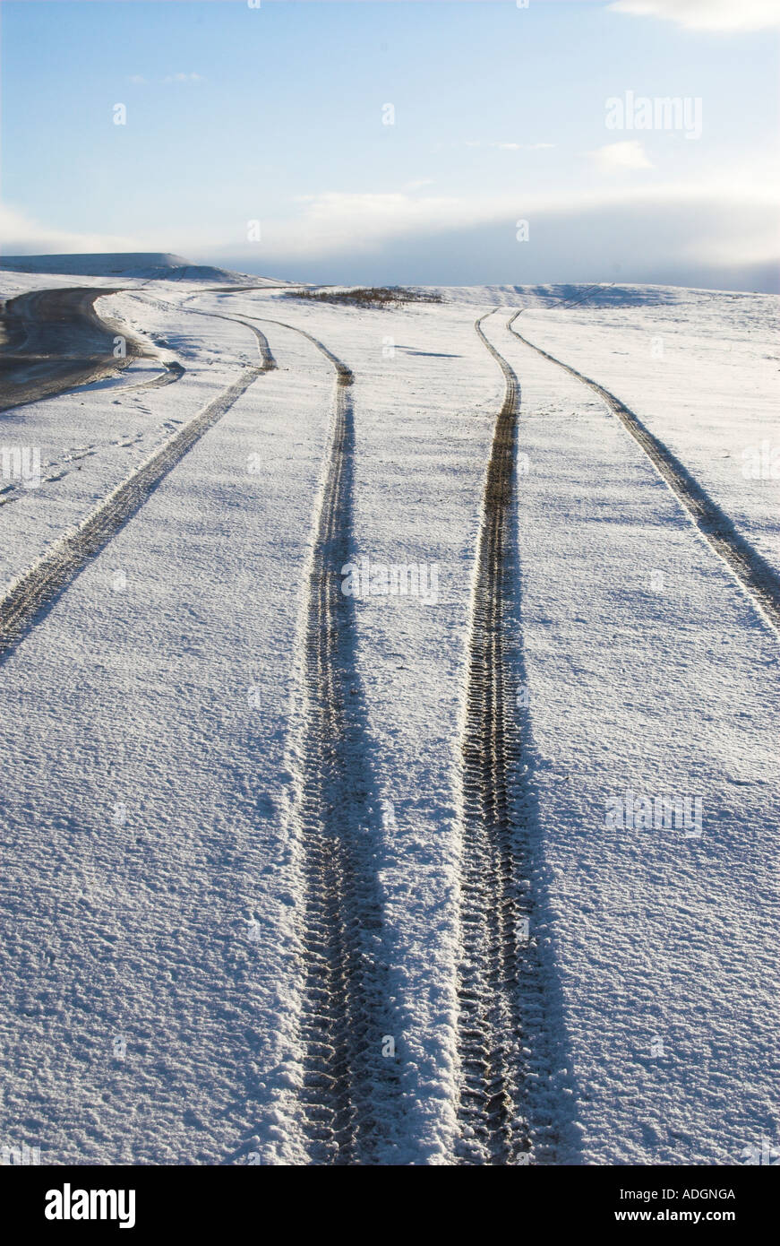 UK Wales Powys tracks through wintery landscape Stock Photo