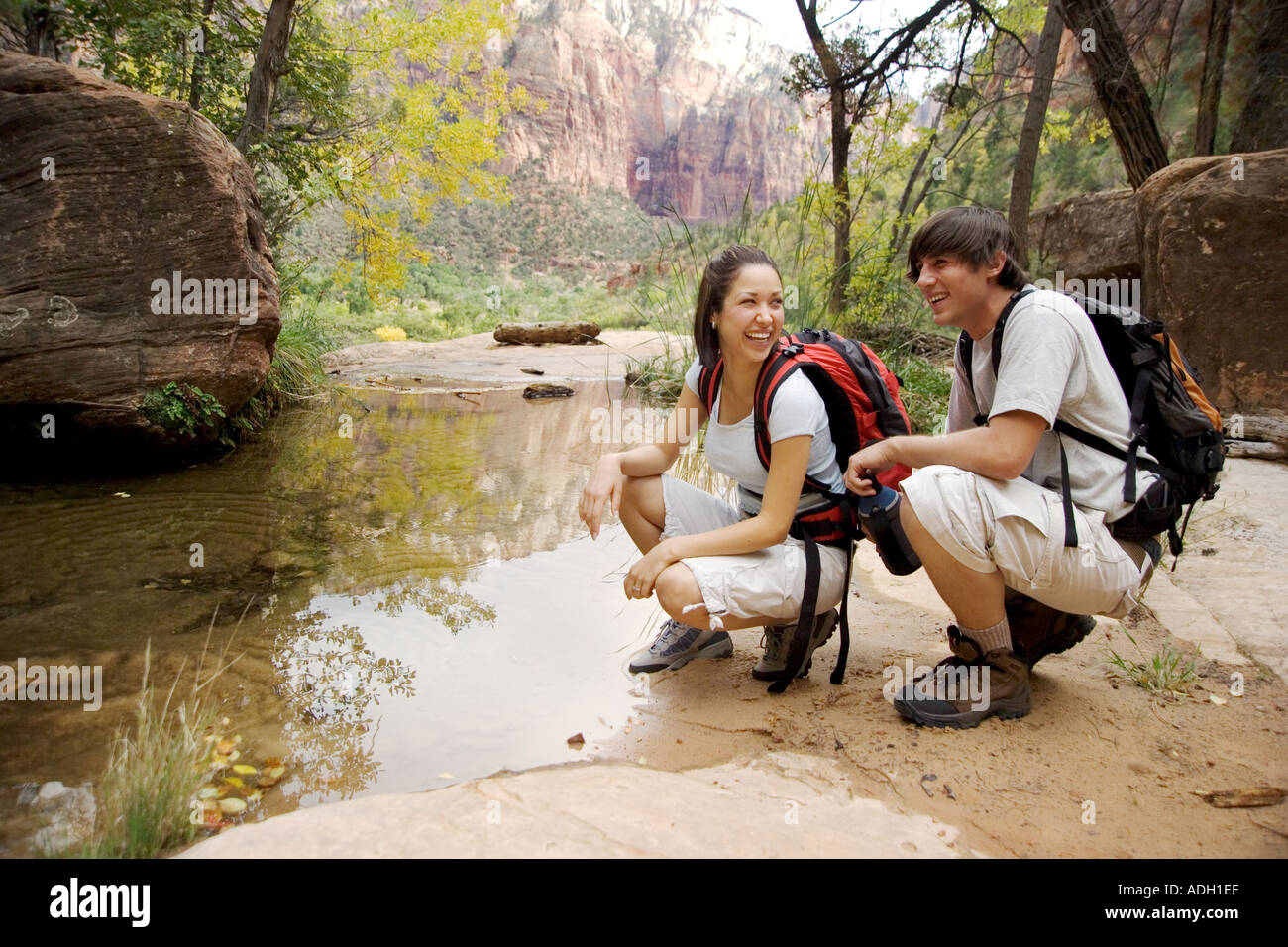 Backpacking couple in Zion National Park Utah USA Stock Photo Alamy