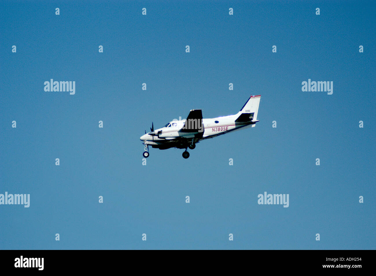 Airplane in the air Beechcraft Queen Air twin Landing Stock Photo Alamy