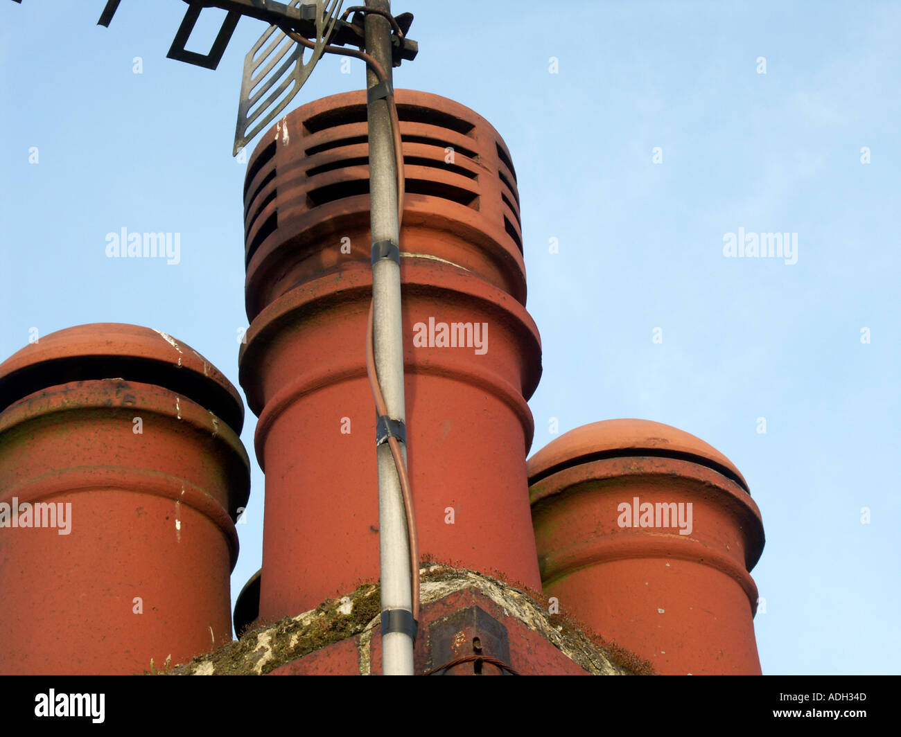 Chimney pots with TV aerial Stock Photo