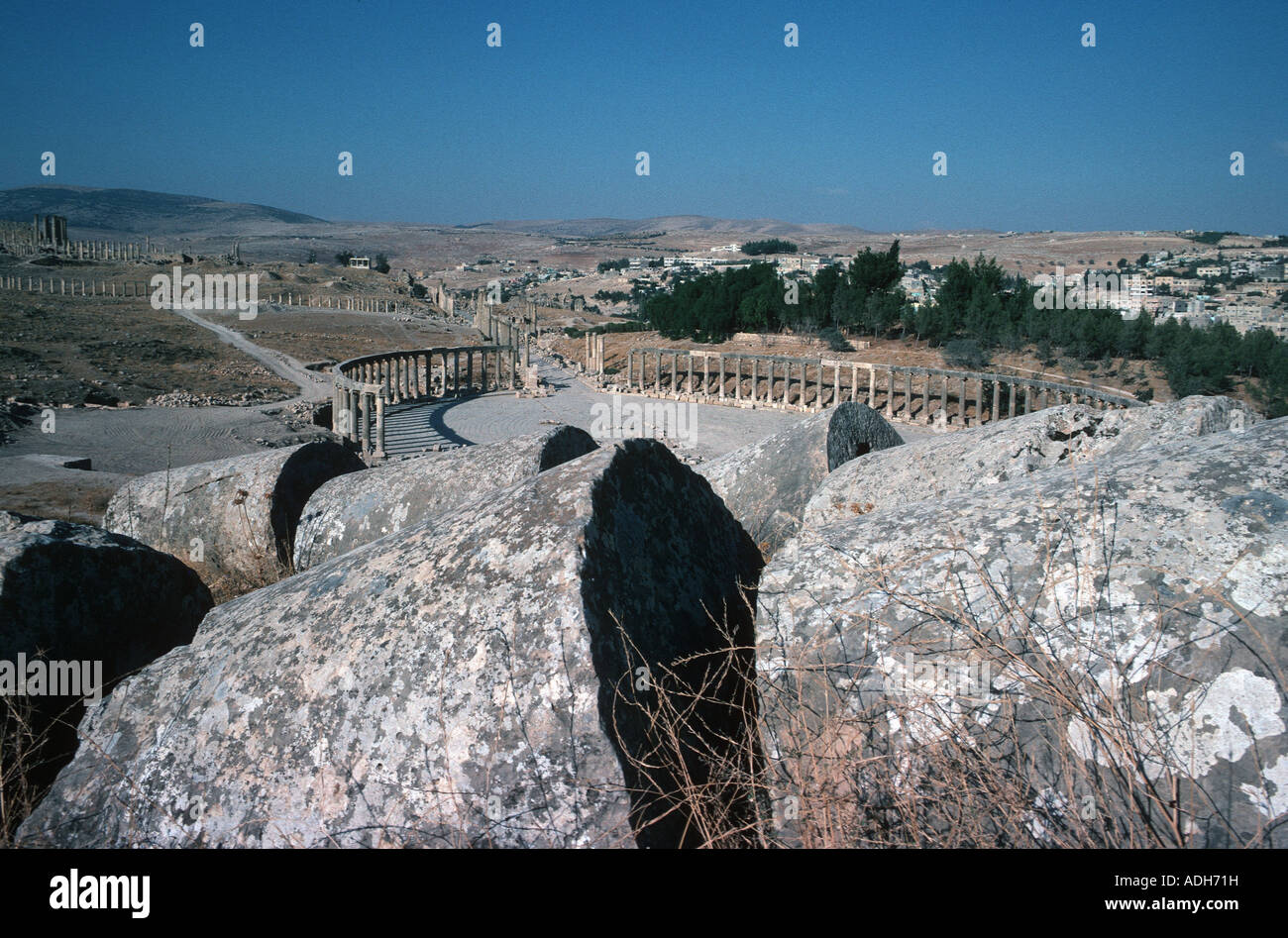 Ruins of Jerash near Ajlun in Gilead mountains Jordan with juge broken pillars in foreground Stock Photo