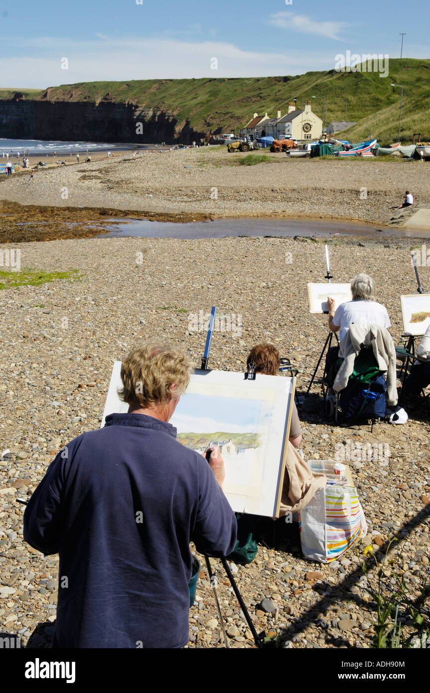 Artists painting on Saltburn beach Stock Photo