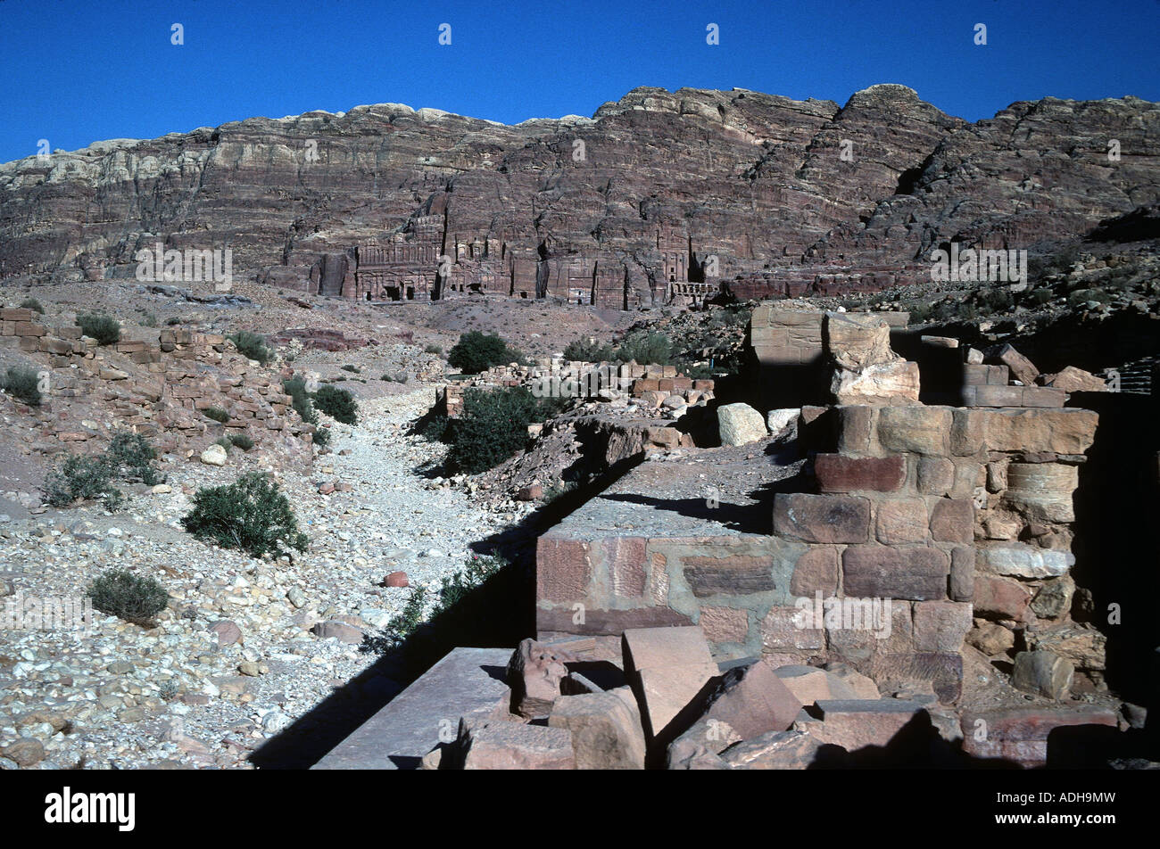 Old stone carved dwellings and tombs in ancient archeological city in ...