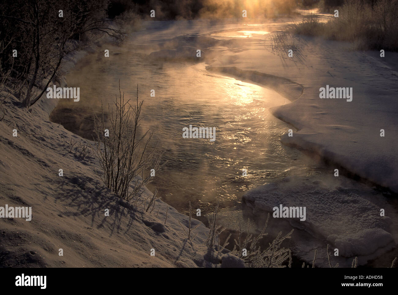 steam rising from freezing Anchor River snow winter 10F Kenai Peninsula Alaska Stock Photo