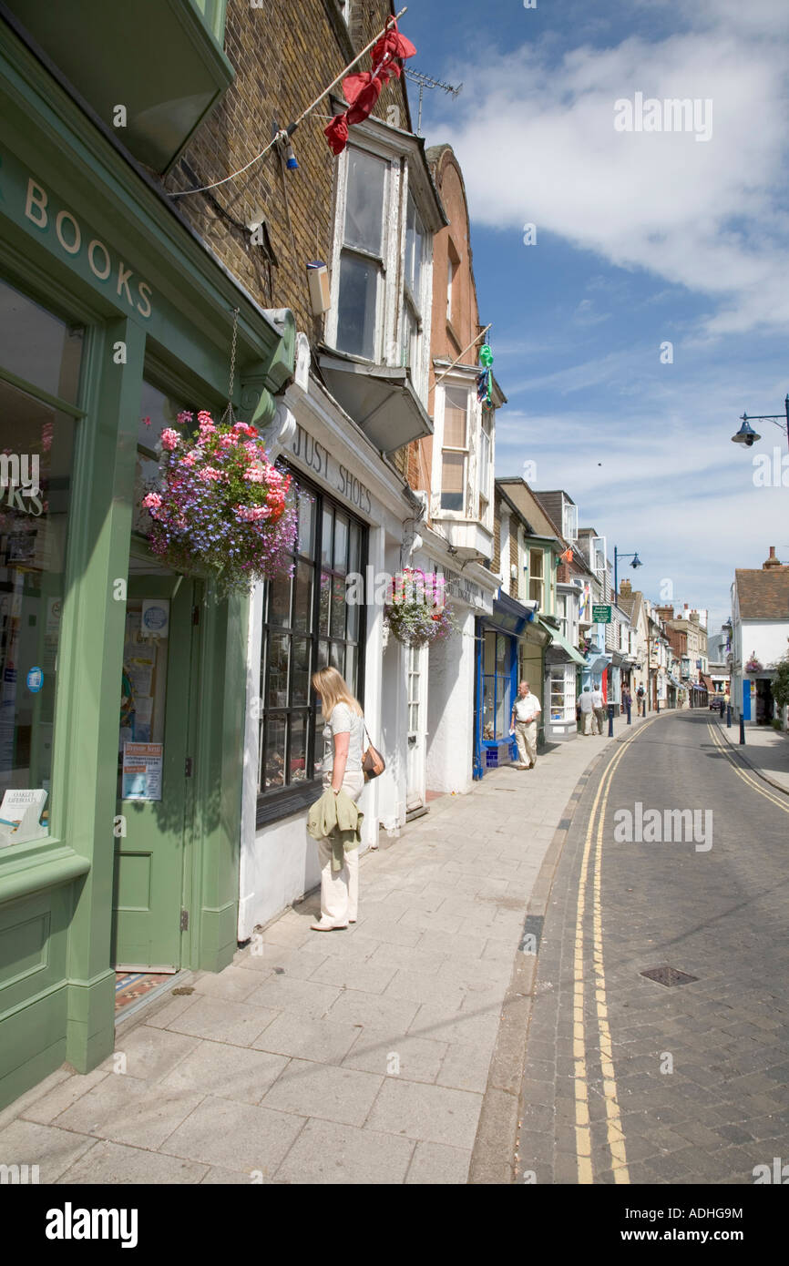 Window shopping in Harbour Street Whitstable Kent England Stock Photo
