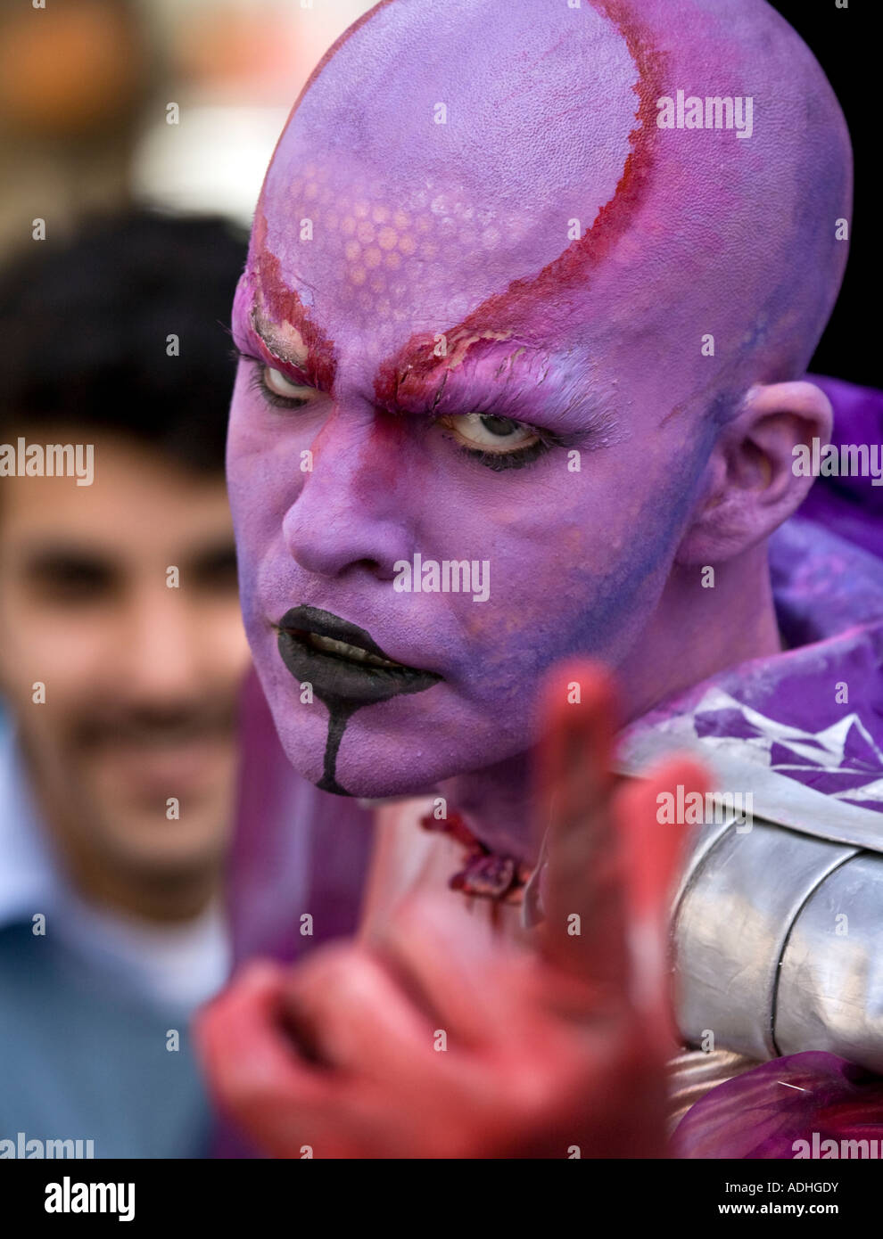 An entertainer dressed as an Alien at the Edinburgh festival fringe Royal Mile. Scotland. Stock Photo