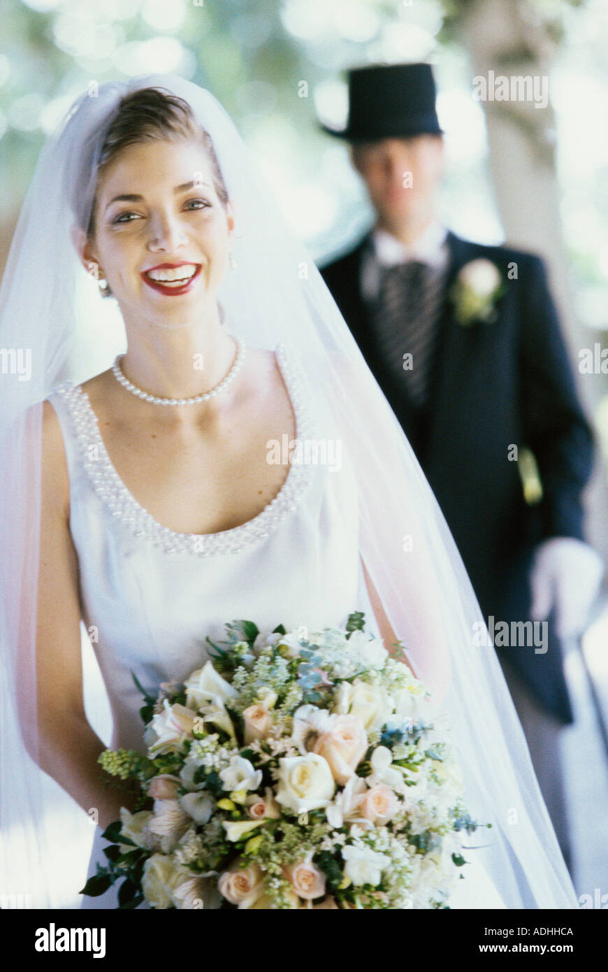 Bride groom standing behind hi-res stock photography and images - Alamy