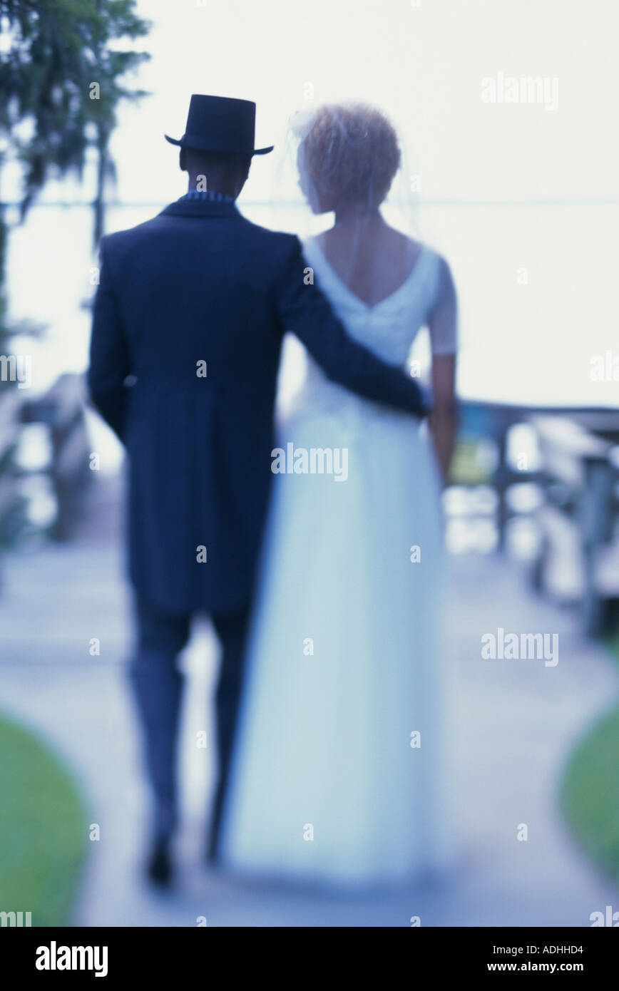 Rear view couple walking hi-res stock photography and images - Alamy