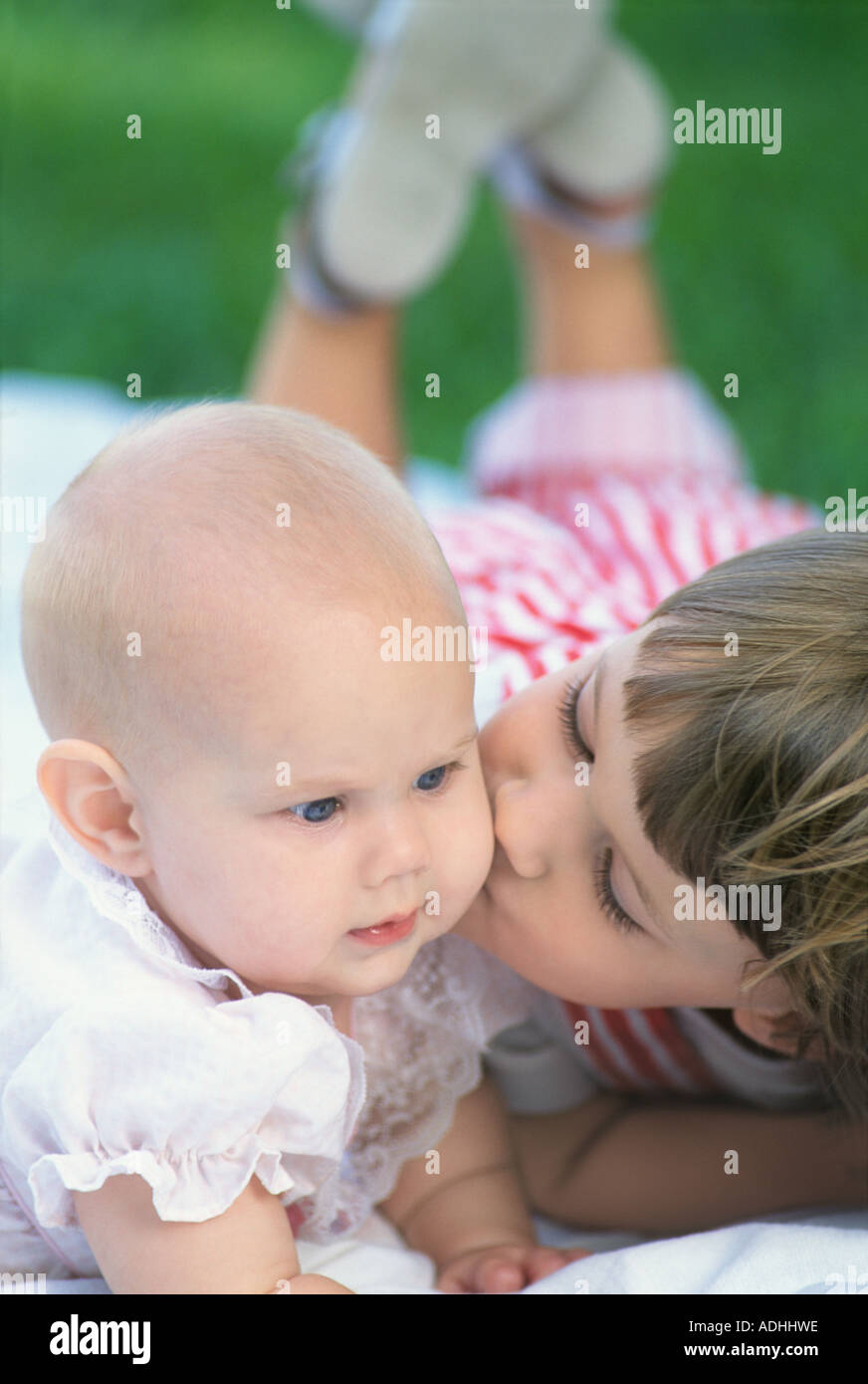 is it ok to kiss baby on cheeks