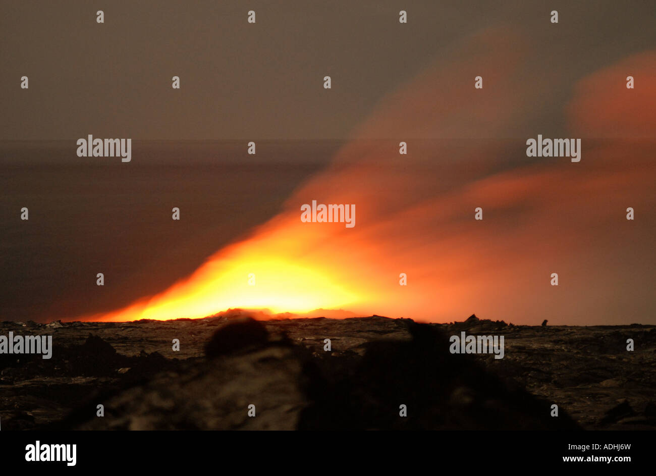 Lava meets the Ocean at night in Hawaii, Big Island, Vulcanoe National Park Stock Photo