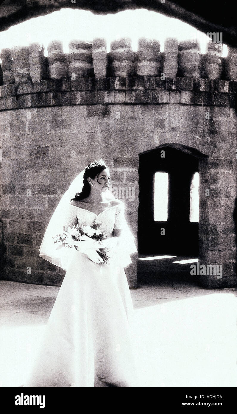 Cheerful bride holding bouquet hi-res stock photography and images - Alamy
