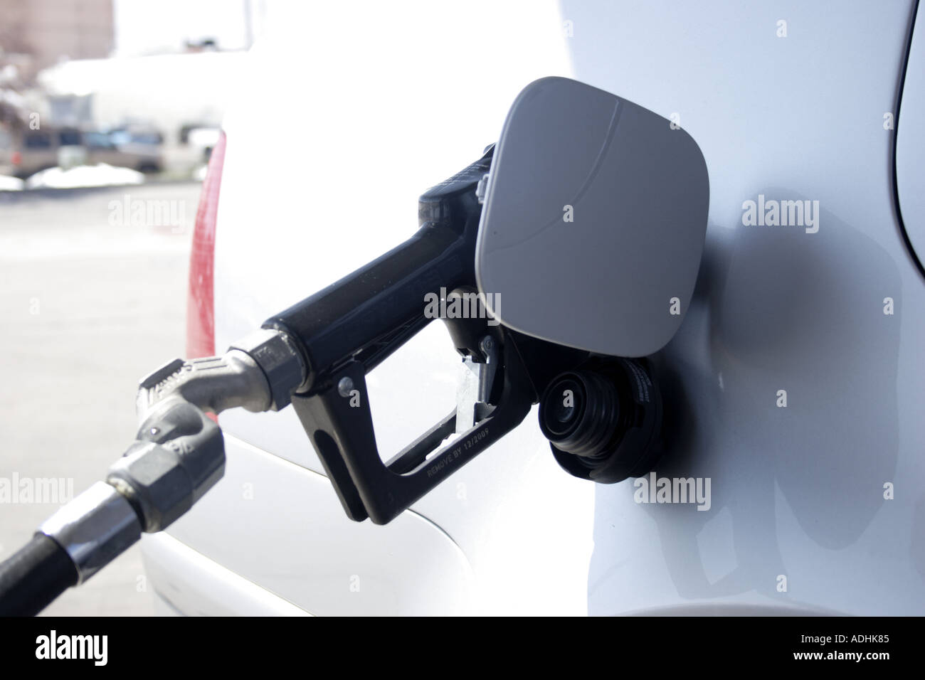 petro pertroleum gas gas tank gas nozzle in car filling station filling