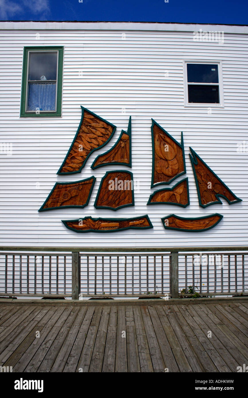 village of Digby, art at facade of oceanfront house, Nova Scotia, Canada, North America. Photo