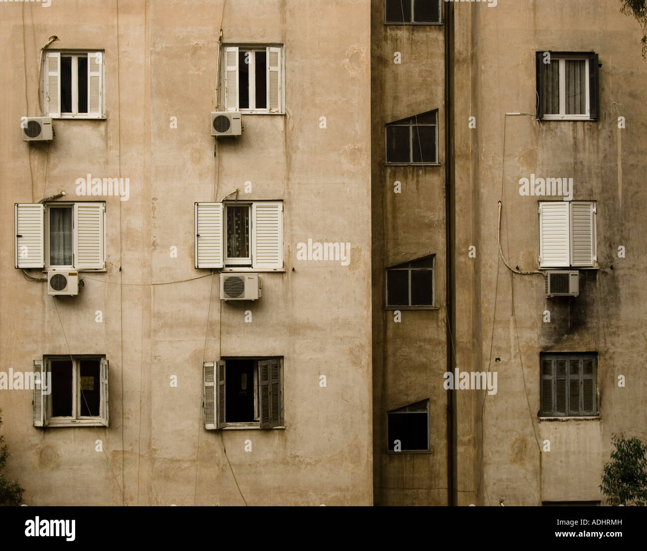 Backside of dirty old post-war grey buildings in Athens Stock Photo