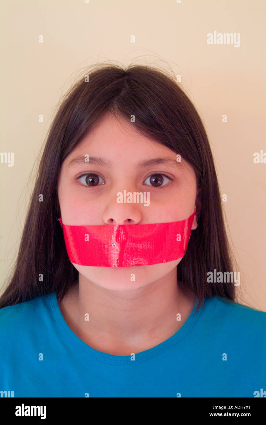 Young girl mouth taped gagged hi-res stock photography and images - Alamy