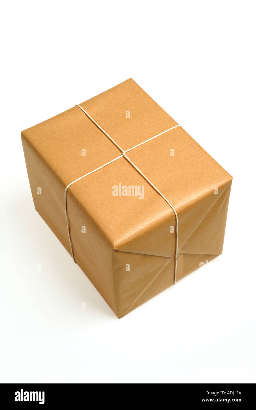 Brown paper parcel tied with string Stock Photo