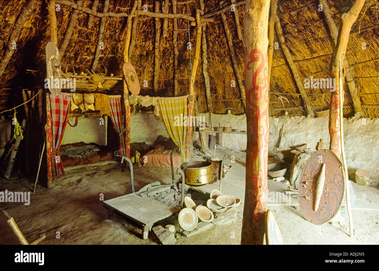 Celtic Iron Age roundhouse reconstructed on original foundations at