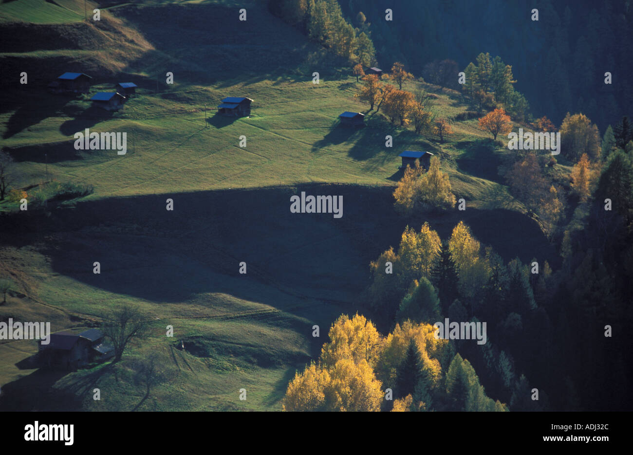 Alpine meadows and farms Binn valley Switzerland Stock Photo