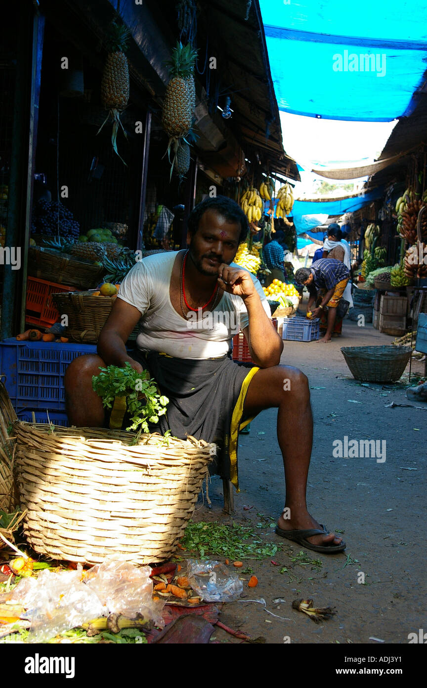 Market vegetable seller Connemara market Palayam Trivandrum Thiruvananthapuram Kerala South India Indian man Stock Photo