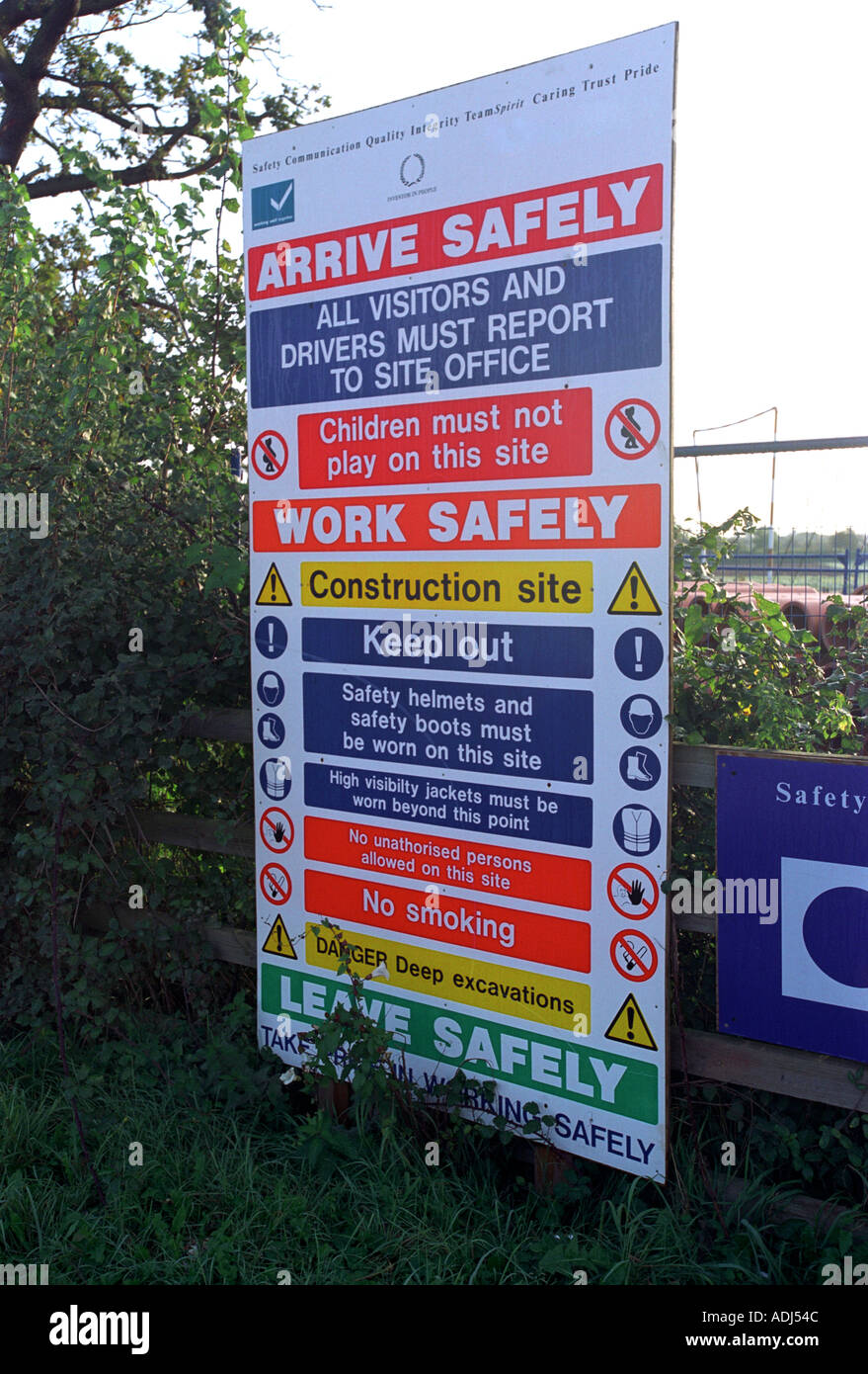 Safety warning sign at landfill site Stock Photo