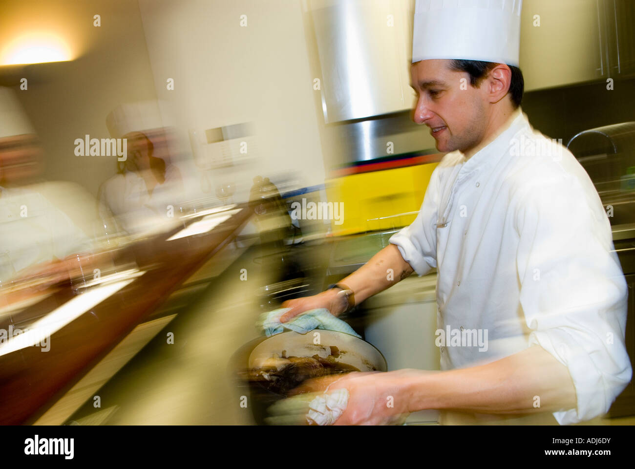 Students take part in a cookery school in the City of London February ...