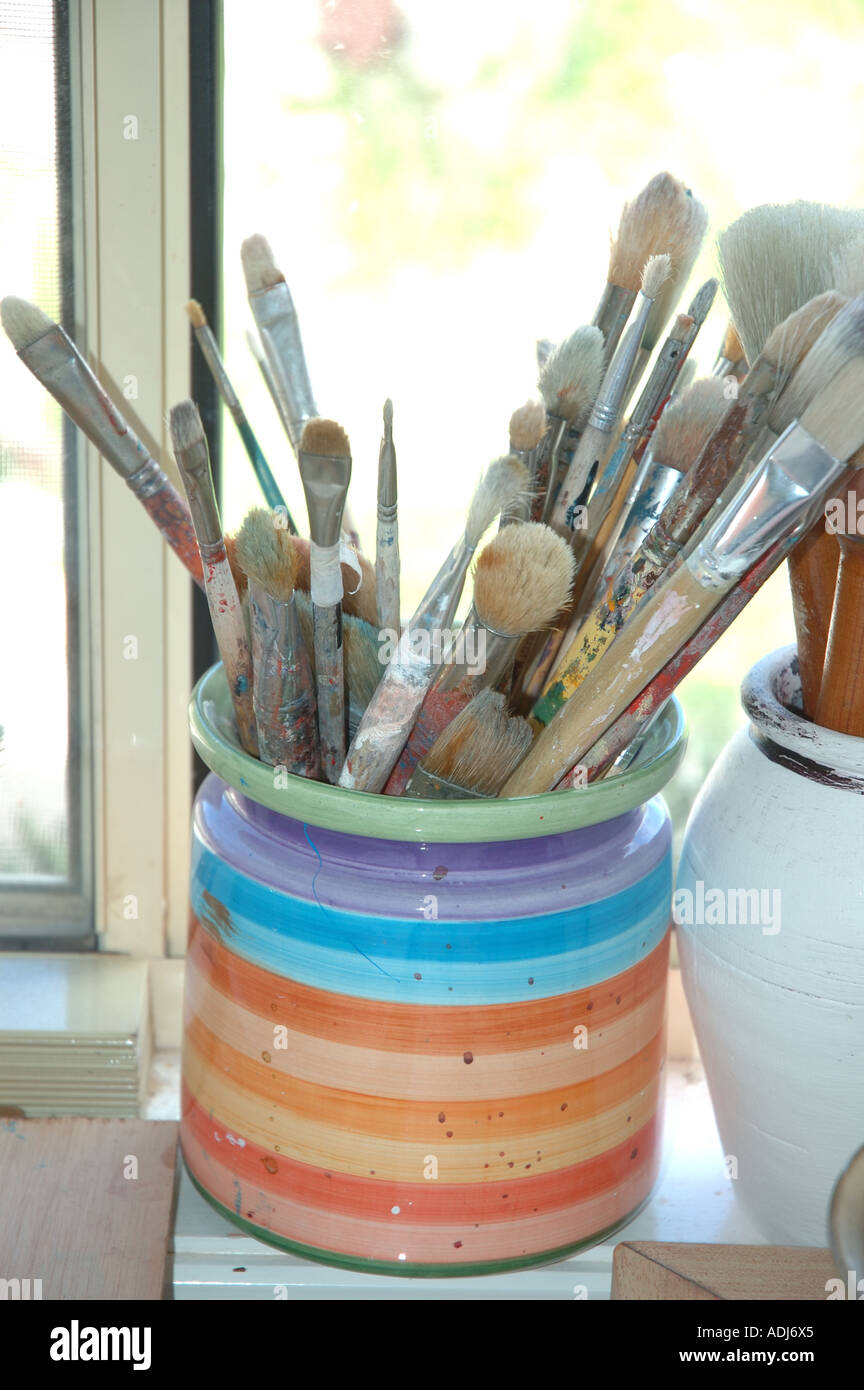 jar of Artist paint brushes in studio Stock Photo - Alamy