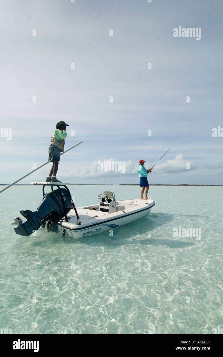 GREATER EXUMA BAHAMA Fly Fisherman Bone Fishing in Emerald Waters