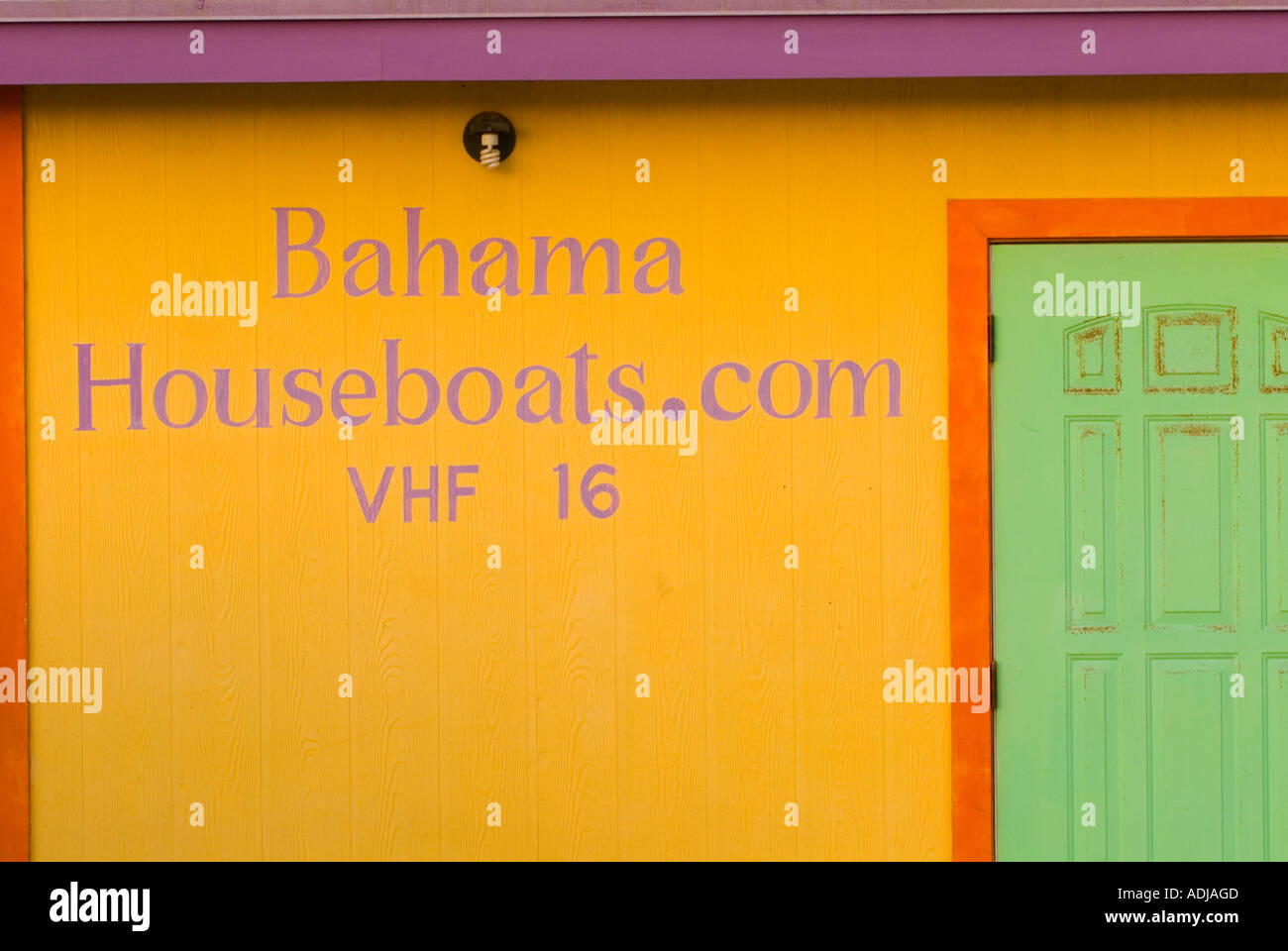 GREATER EXUMA BAHAMA TOWN Colorful houseboat rental building at Elizabeth Bay Harbour