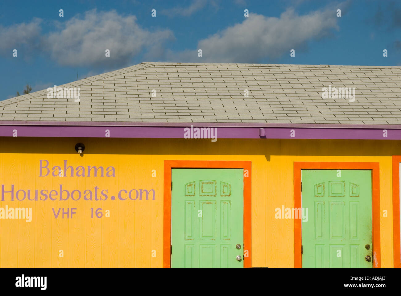 GREATER EXUMA BAHAMA TOWN Colorful houseboat rental building at Elizabeth Bay Harbour