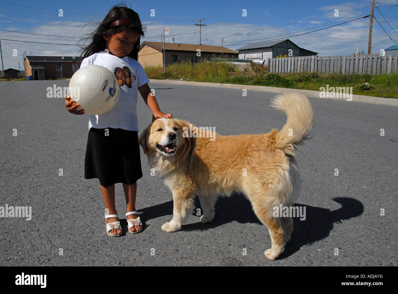 Native child with dog Waswanipi reservation Northern Quebec Stock Photo