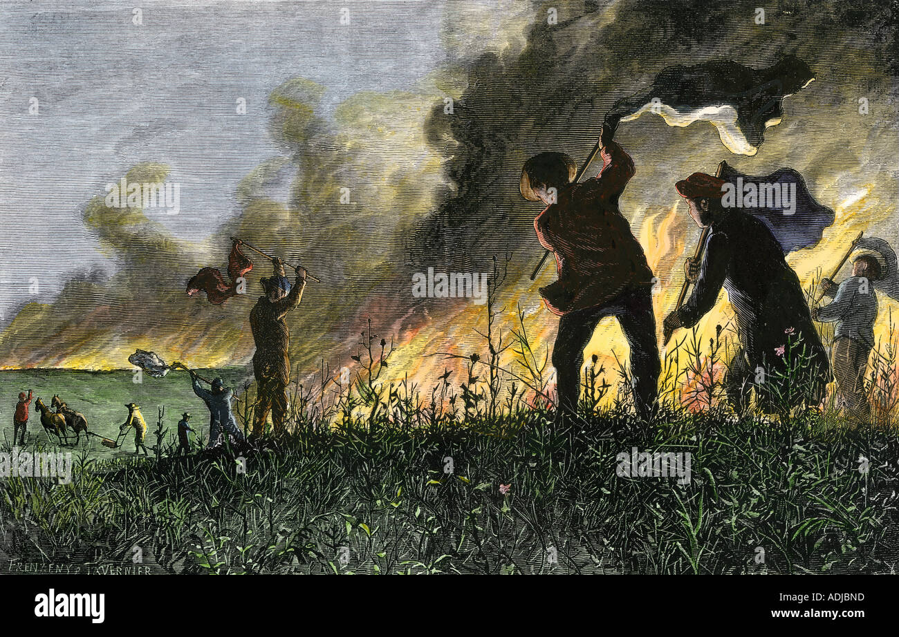 Homesteaders on the Great Plains fighting a prairie fire 1800s. Hand-colored woodcut Stock Photo