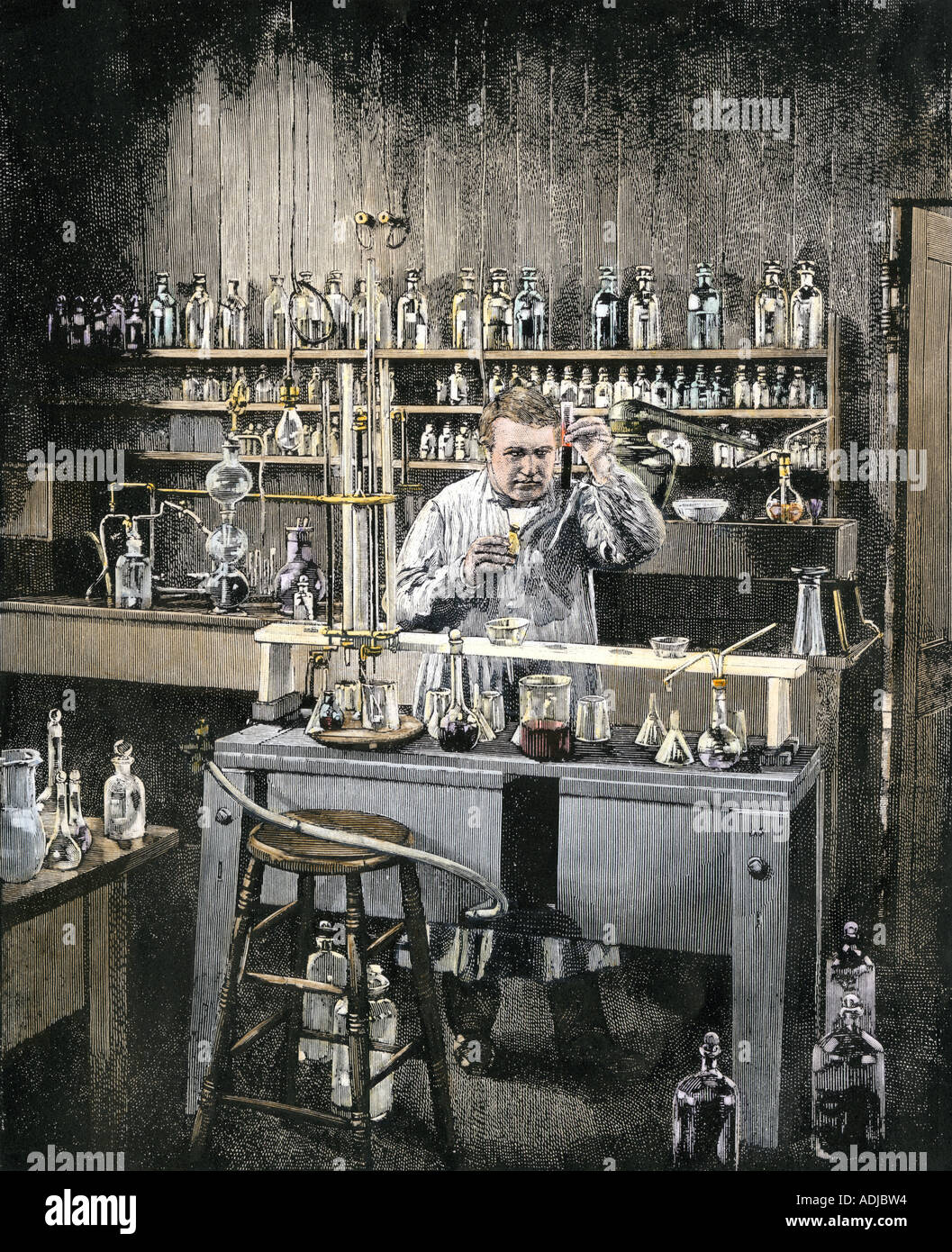 Thomas Edison the wizard of Manlo Park in his New Jersey laboratory. Hand-colored woodcut Stock Photo
