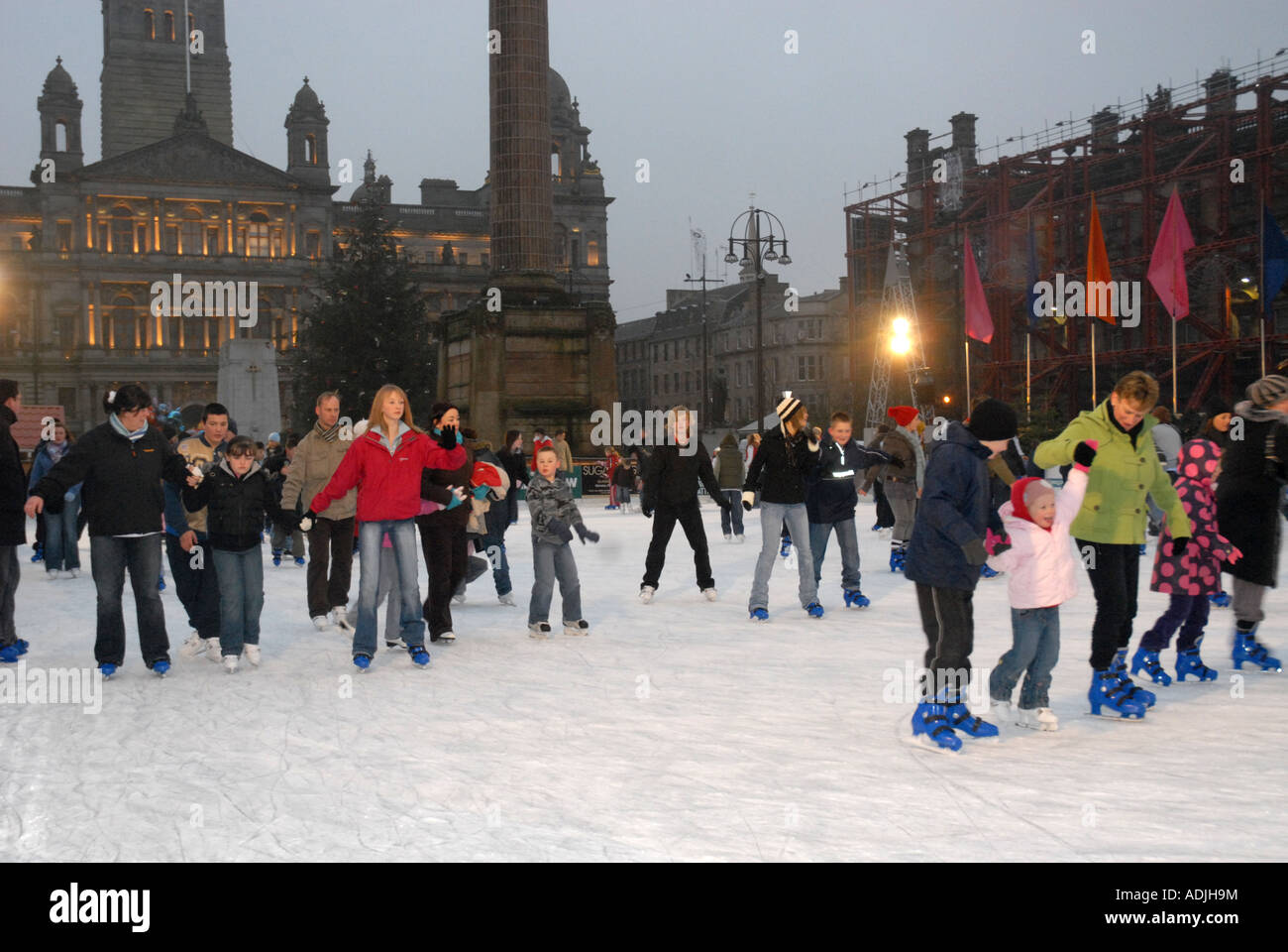 Ice Skating on Outdoor Ice Rink, George Square. City Chambers in Background. Glasgow. Scotland. Xmas 2006 Stock Photo