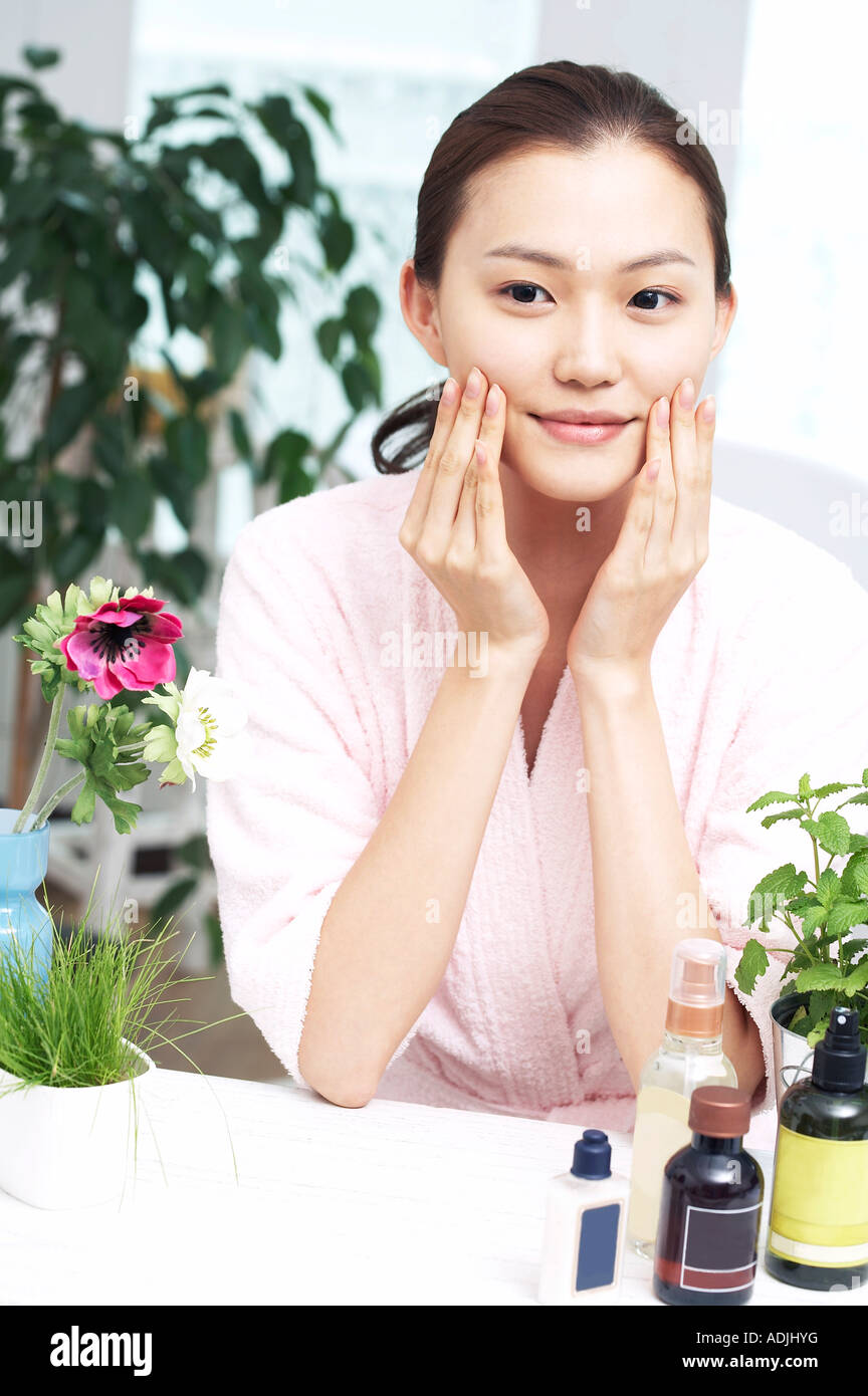 woman touching her skin Stock Photo - Alamy