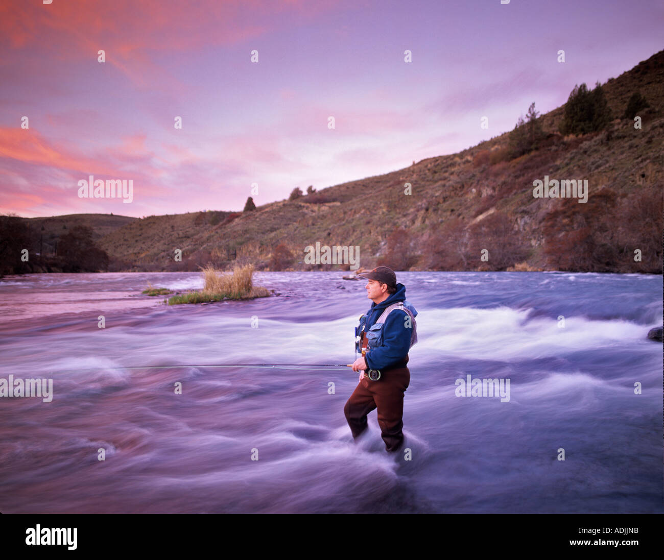 Fly fisherman on Decshutes River Oregon Stock Photo