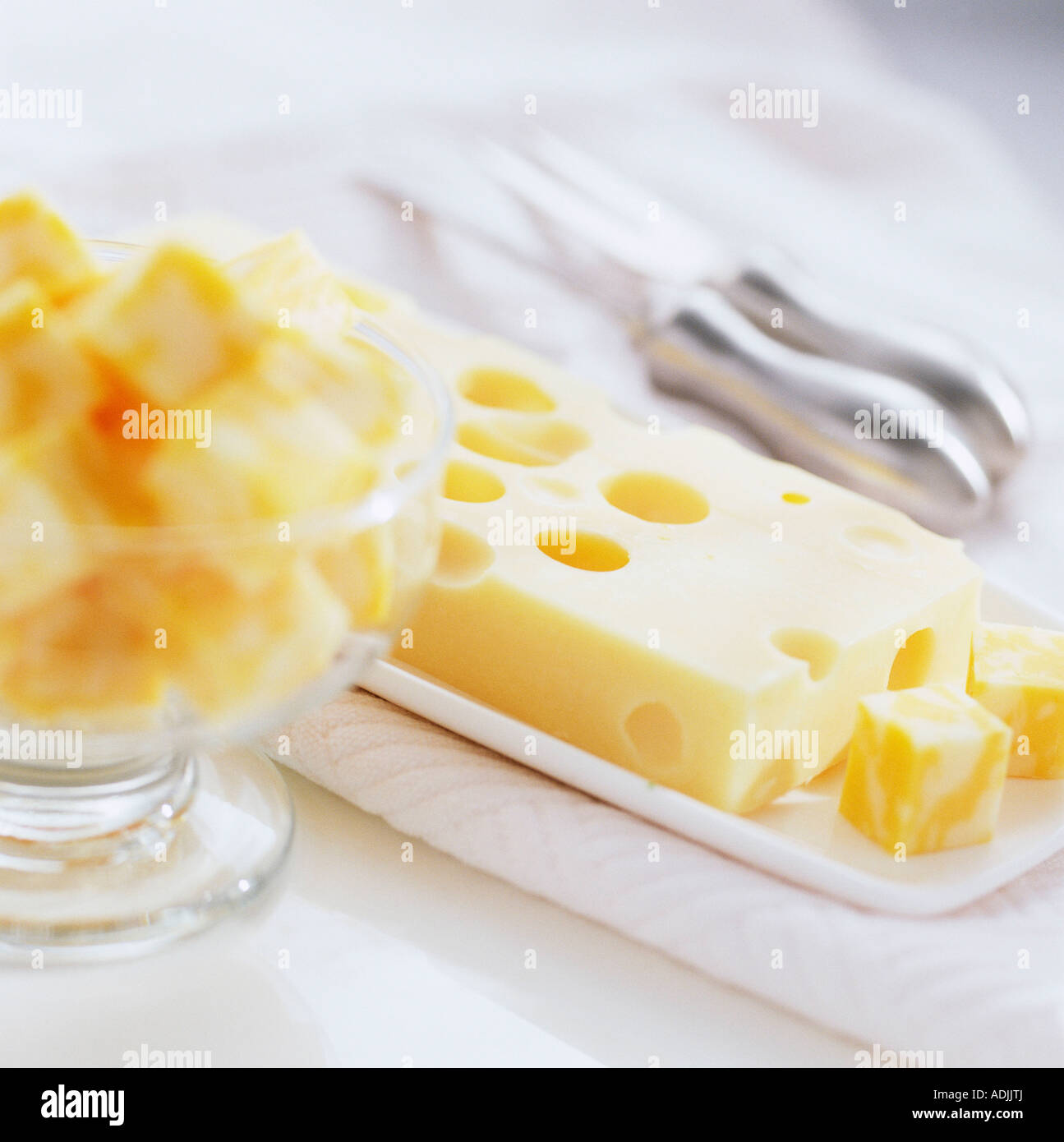 dairy food Emmental cheese knife dish bowl knives Stock Photo Alamy