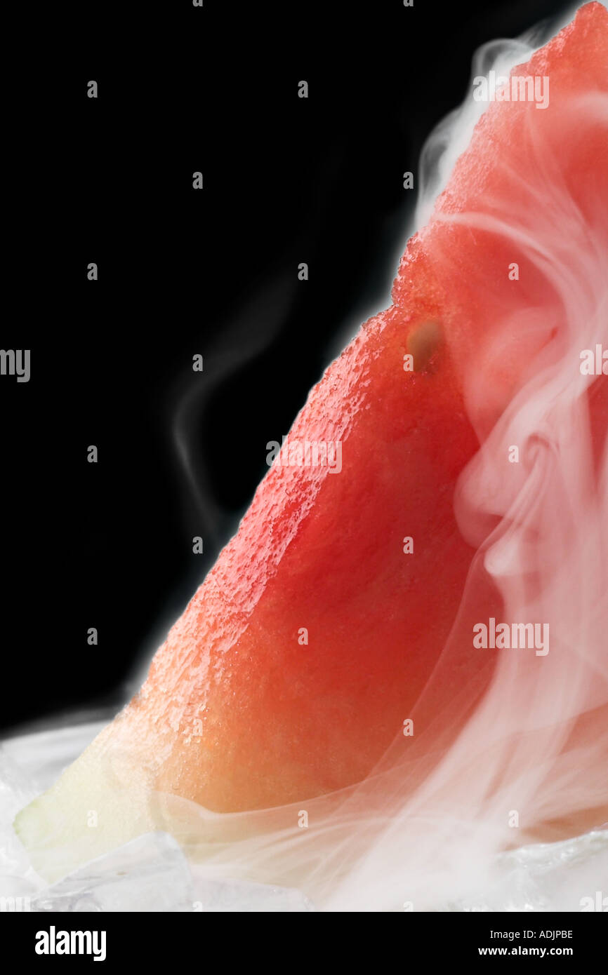 Slice Of Watermelon Sitting On Ice Cubes With Smoke Mist And Cold Draft Flowing Upward Stock Photo Alamy